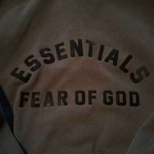 Men’s Essentials Fear of God Hoodie, size M.